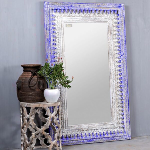 Welcome the Bia Wooden Carved Mirror Frame in Purple Distress into your world and let the magic of unconventional elegance begin.