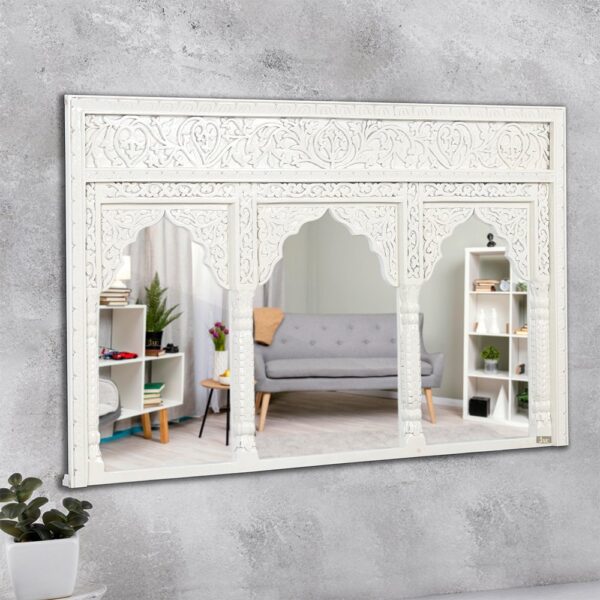 Sleek white distressed wooden mirror frame crafted from solid wood. | wood carving mirror frame online in India | antique wooden mirror | white mirror frame | JAE Furniture